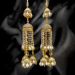 Traditional Gold Plated Kundan Kalira with Pearls and Cowrie shells